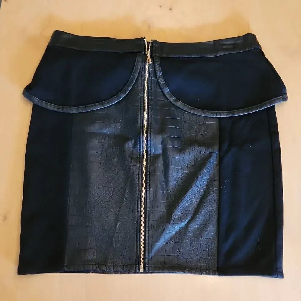 Bebe black mini skirt size large